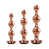 Gender X Gold Digger 3-Piece Rose Gold Beaded Anal Plug With Black Gemstone Base Set